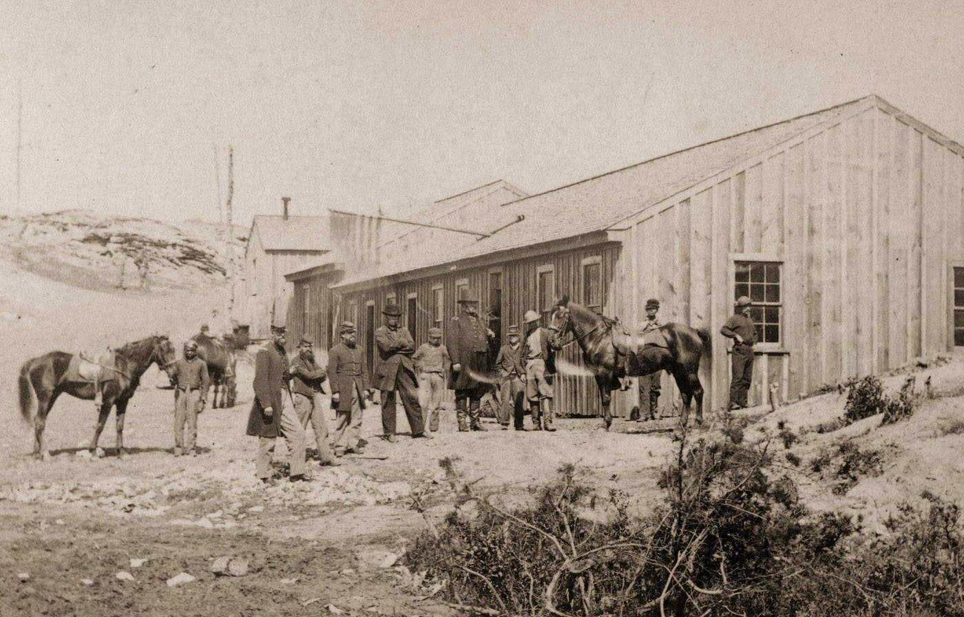 #30 A Civil War scene featuring a view of a Confederate Quartermasters House with a group of officers meeting outside, Washington DC, 1863.