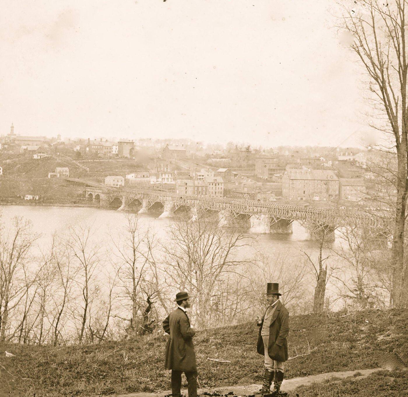 #46 The Aqueduct bridge and Georgetown from the Virginia bank Washington, D.C., 1863
