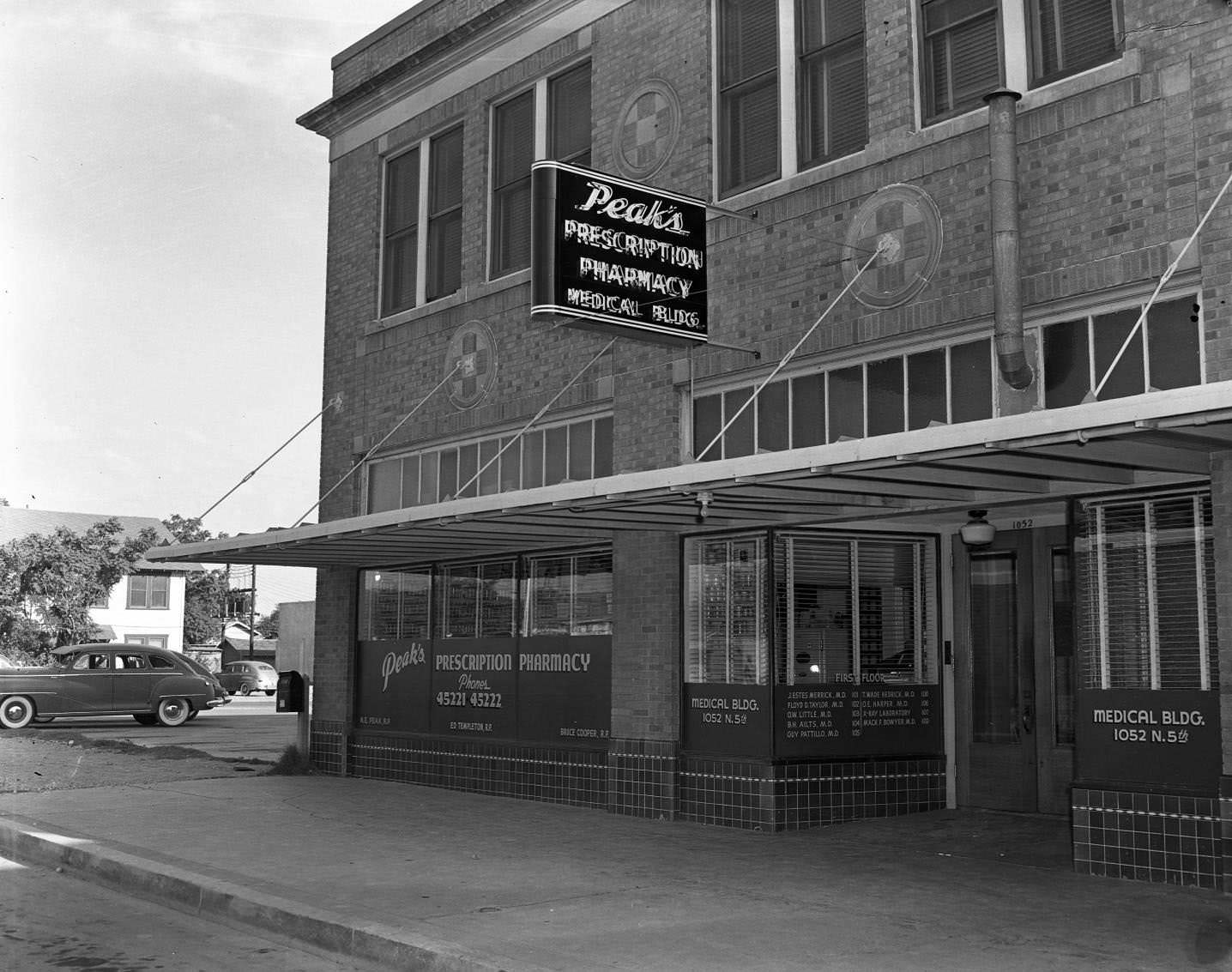 #147 Peak’s Pharmacy at 1052 N. 5th Street in Abilene, 1953