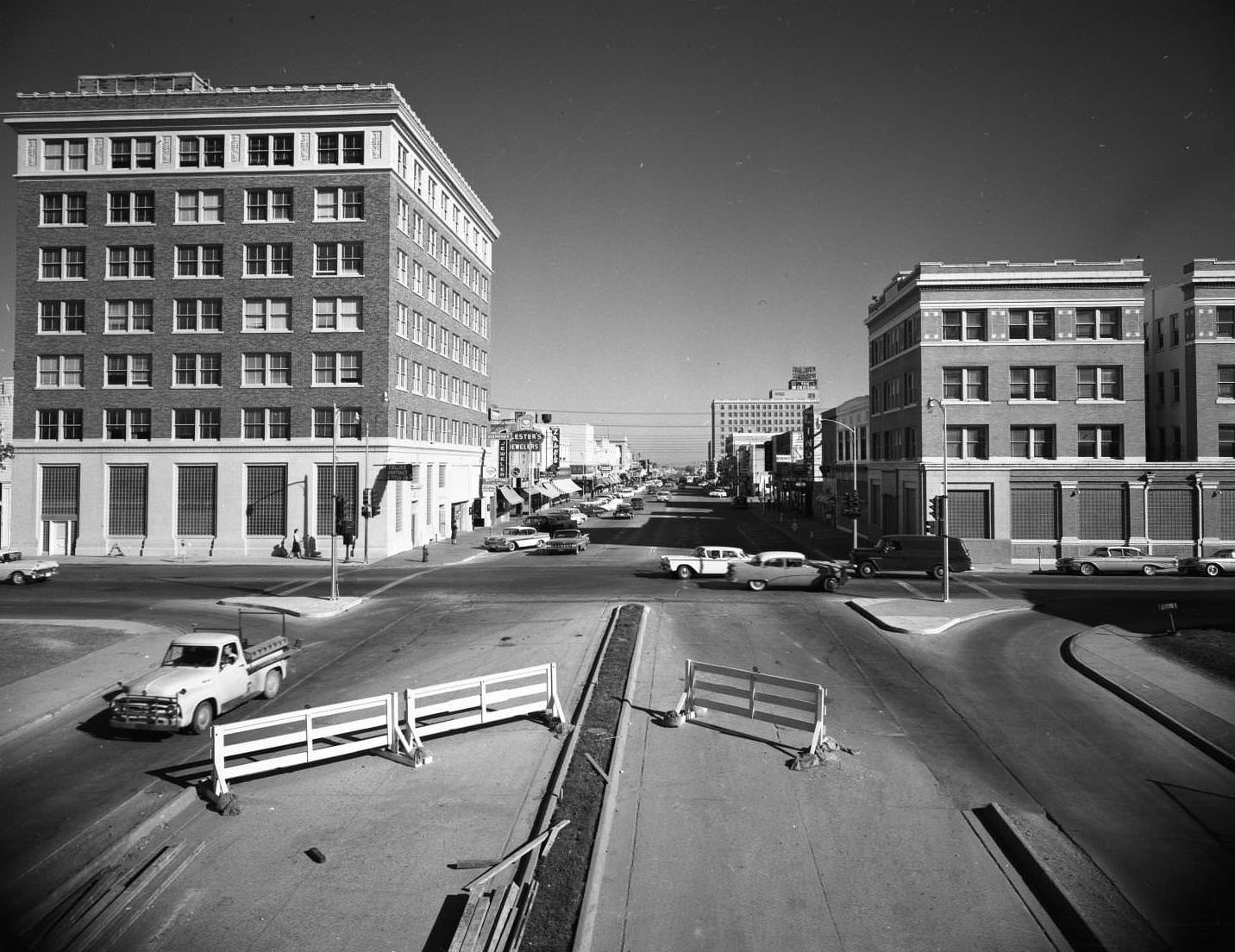#163 Road construction at the corner of Pine Street in Abilene, 1957