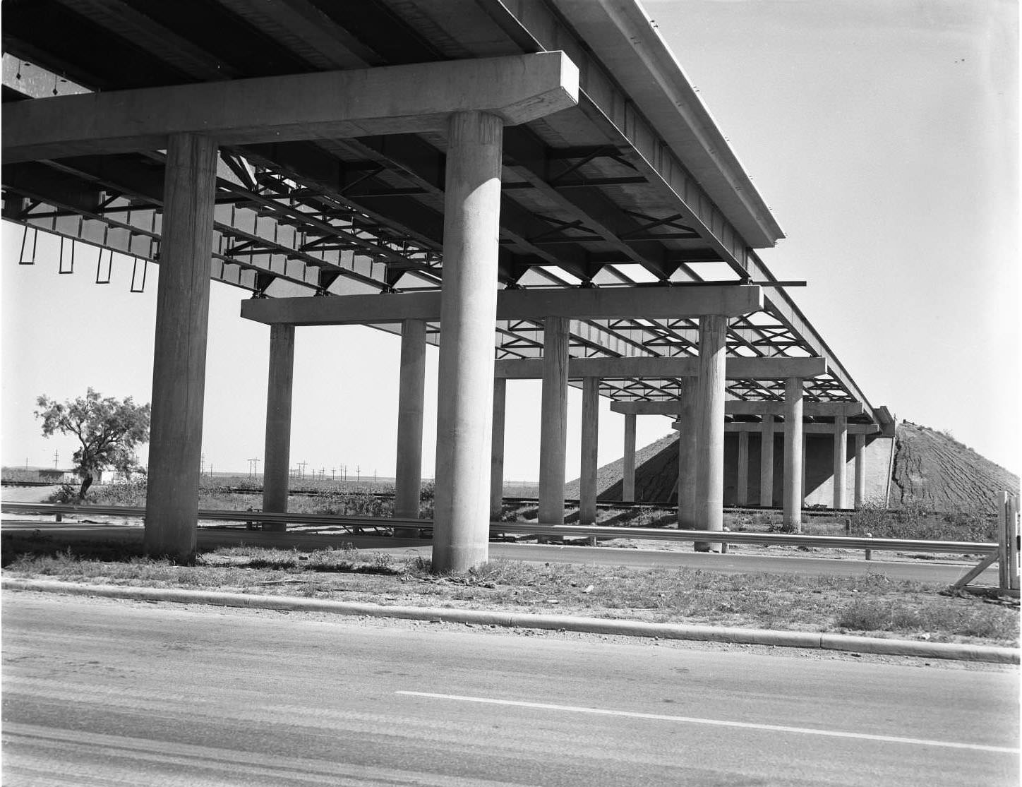 #23 A partially constructed overpass at Highway 80 and S. 1st St. in Abilene, 1958