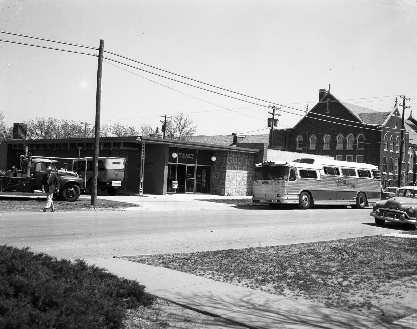 #27 A Trailways bus in front of a Continental Trailways building, 1955