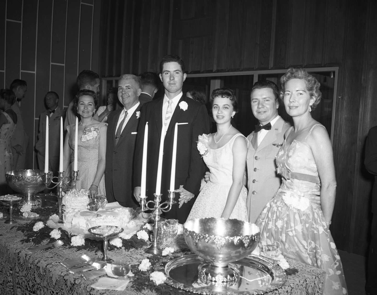 #74 Pete Olds and Louis A. Rochez alongside other people at a banquet at the Dyess Air Force Base, 1954
