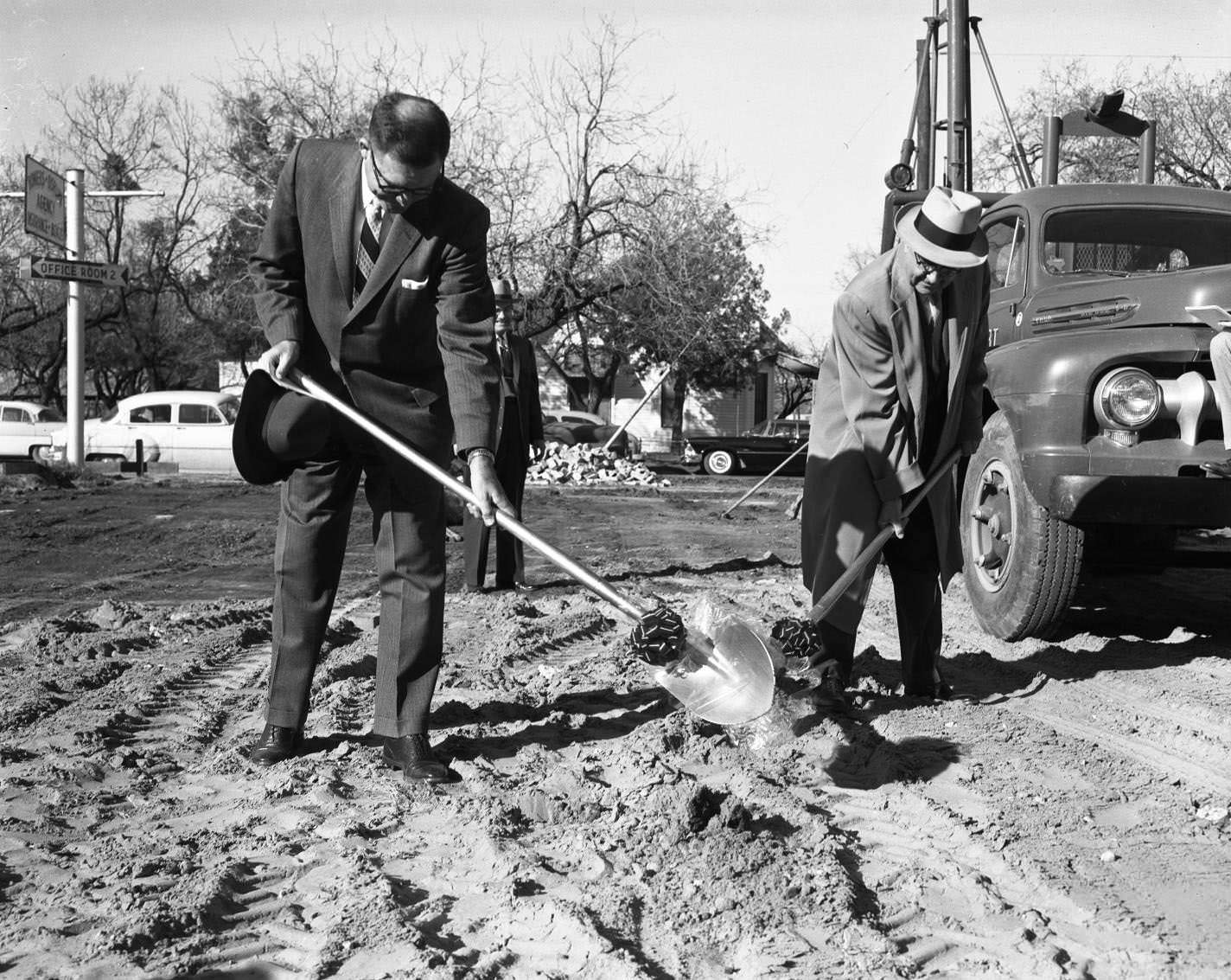 #76 Three men during a ground breaking for the Abilene Chamber of Commerce, 1955