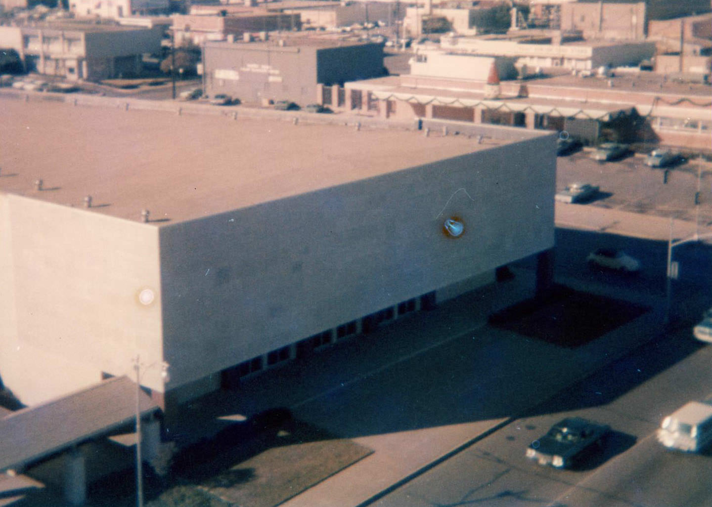 #28 Downtown Arlington, 1973. The First Baptist Church. There are other buildings, cars, and streets.