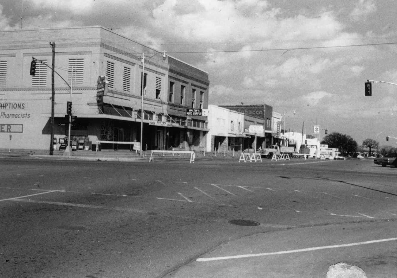 #52 Downtown Arlington being prepared for a demolition in 1972.