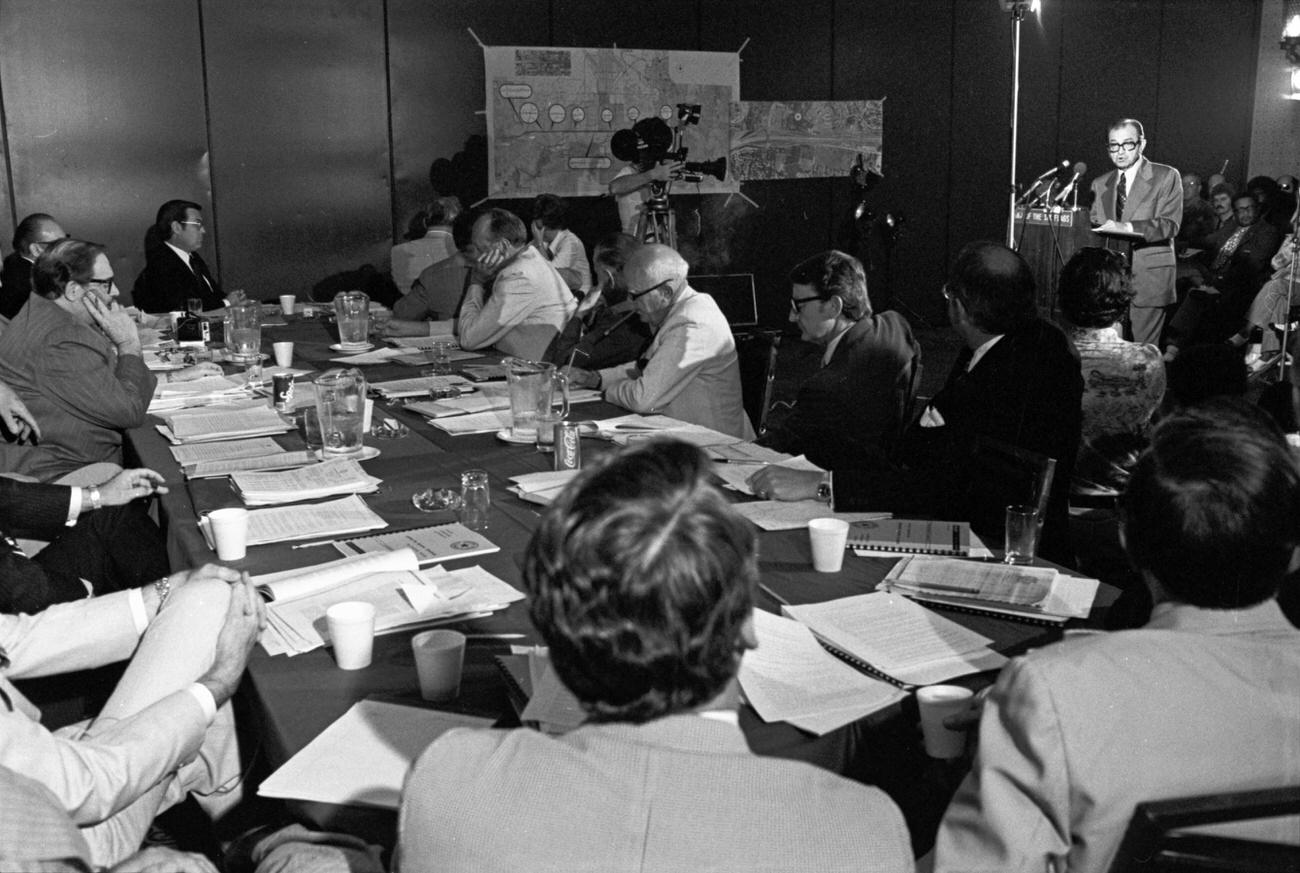 #21 Tom Vandergriff speaking at Texas Turnpike Authority and Texas Highway Commission meeting, 1976