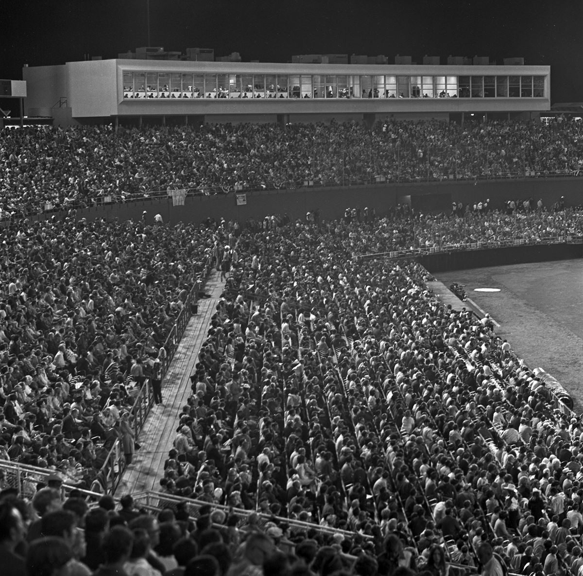 #22 View of the crowd at Arlington Stadium for the Texas Rangers baseball team’s first home game in Arlington, 1972