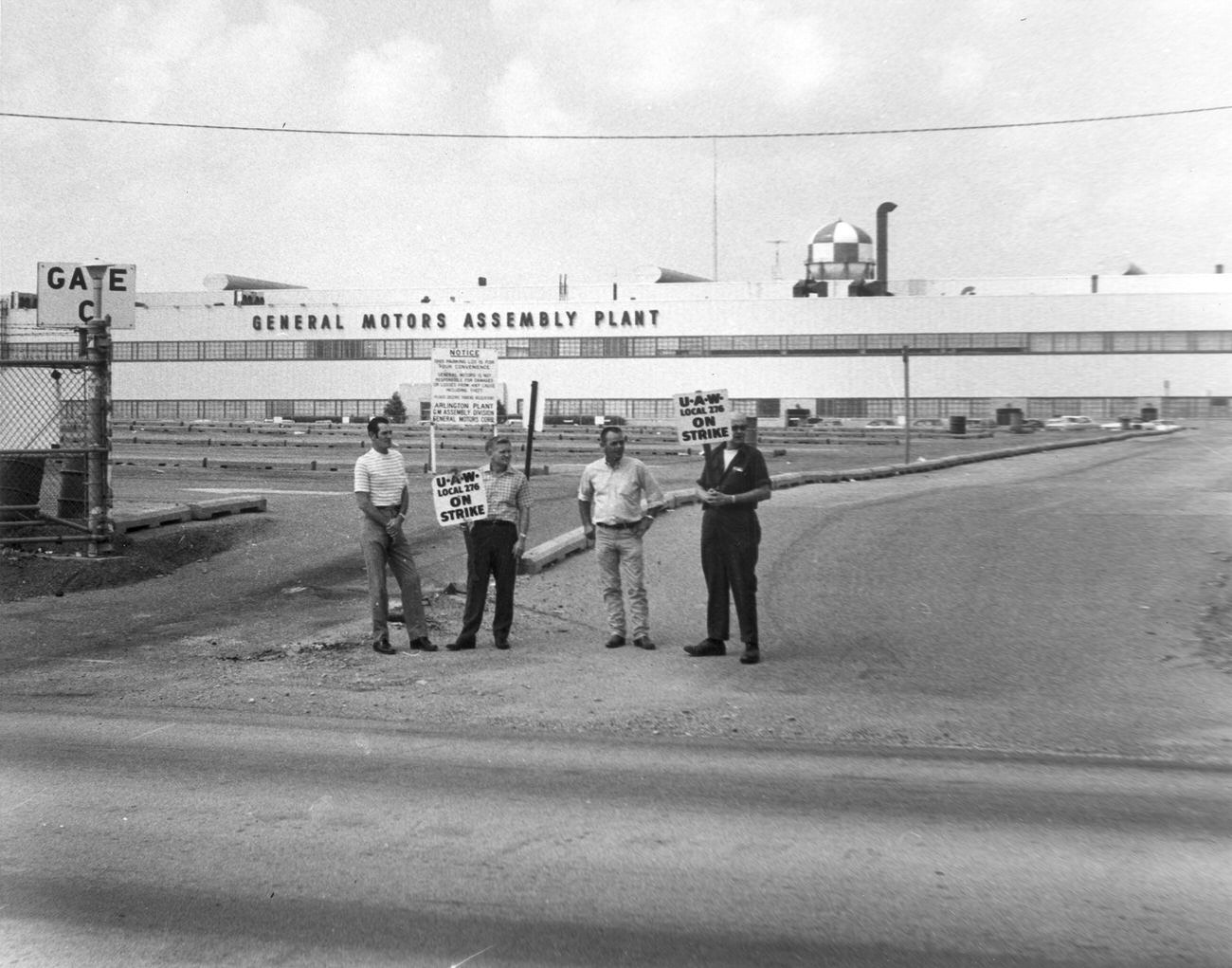 #35 Four men from United Auto Workers (U. A. W.) Local 276 on strike in front of General Motors Assembly Plant, 1970