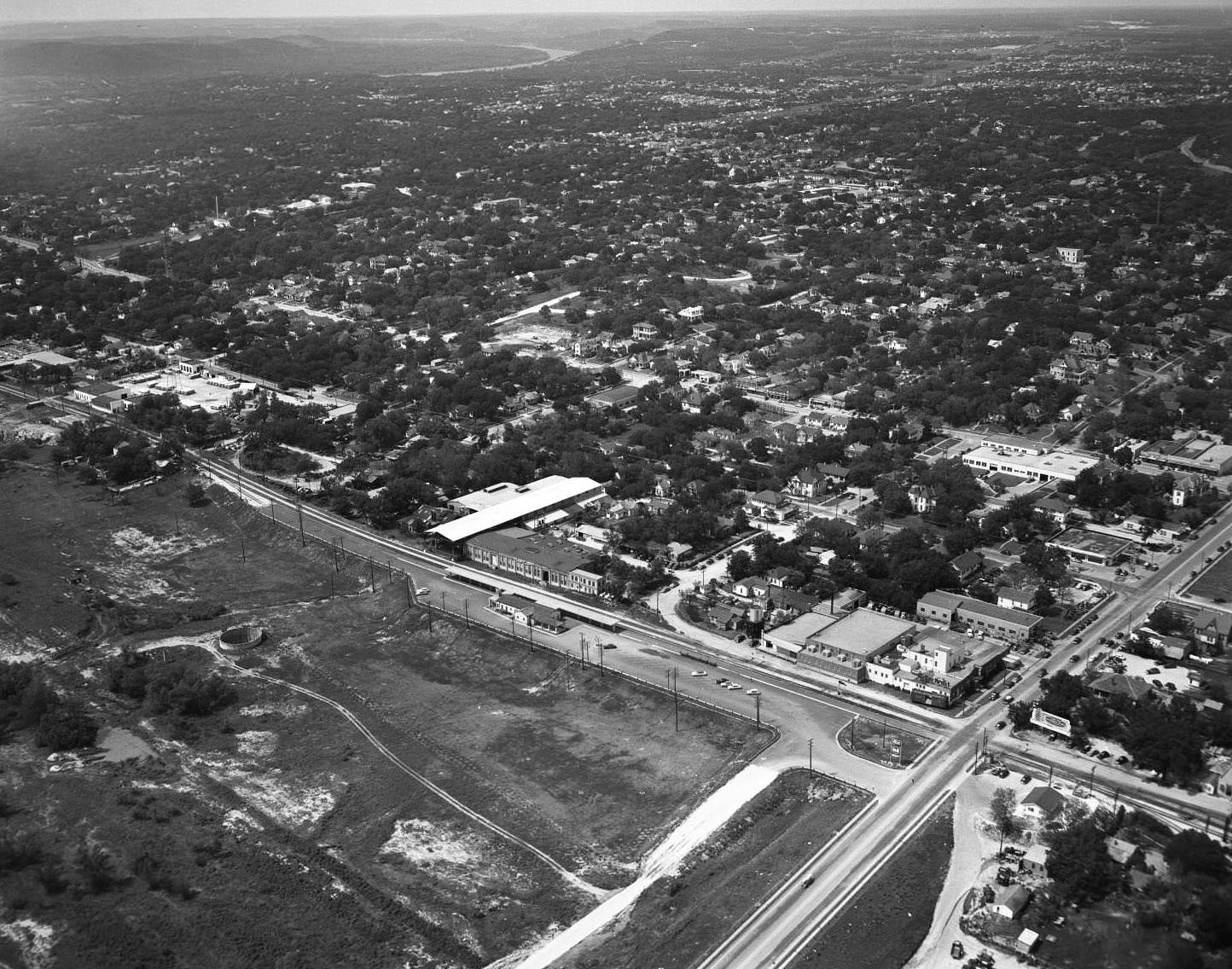 #124 Looking NW from about the north approach from Lamar bridge, 1950