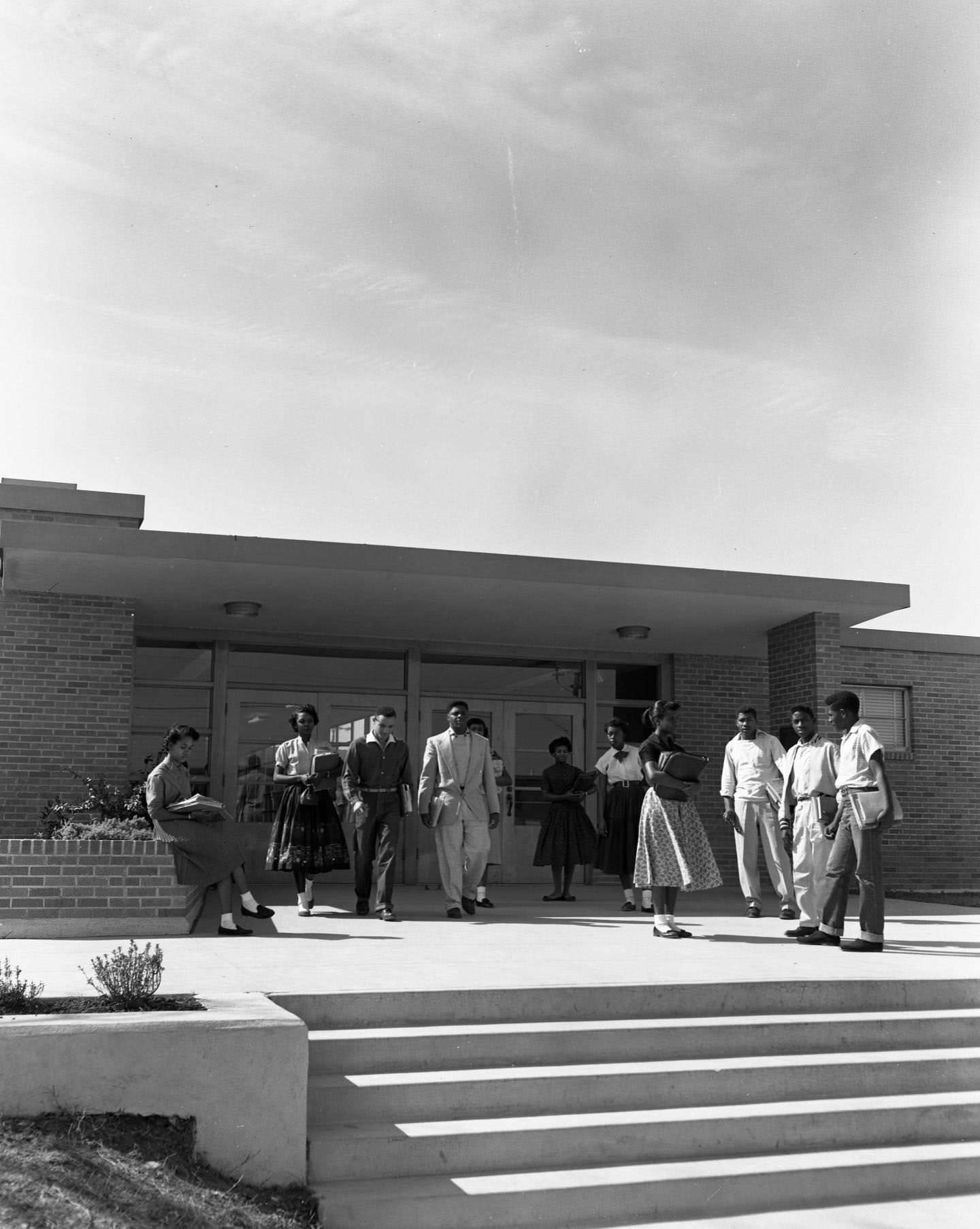 #138 A group of students outside the entrance to Anderson High School, 1956