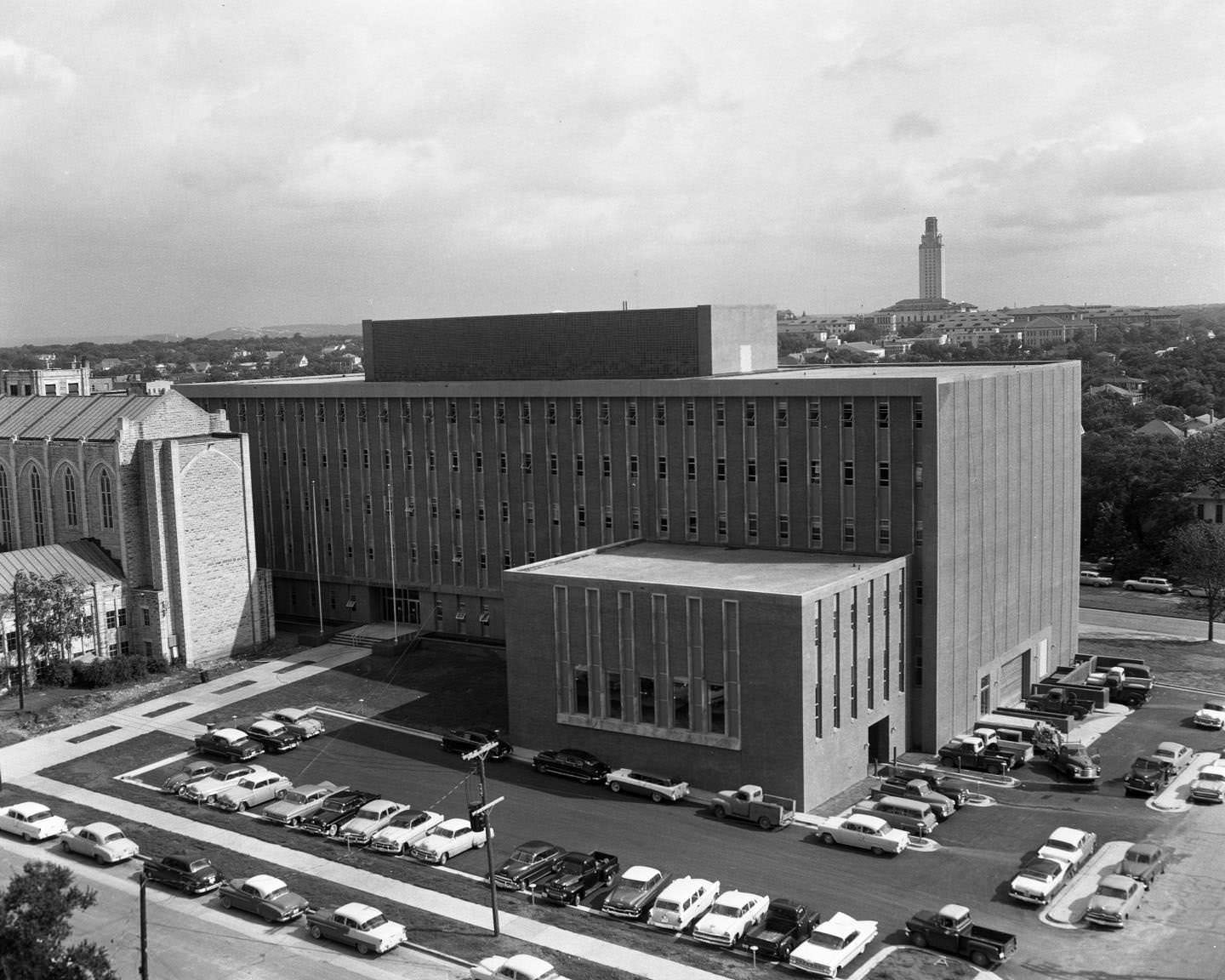 #148 Aerial shot of finished TEC Building. Brazos St on the lower right and 14th on the lower left, 1958