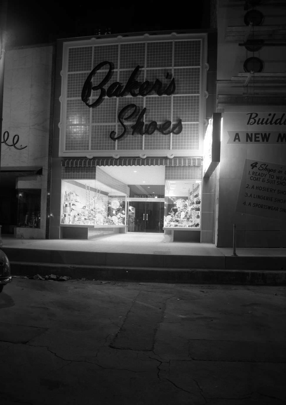 #163 View of Baker’s Shoe Store with show windows. Baker’s Shoe Store was located at 708 Congress, 1950