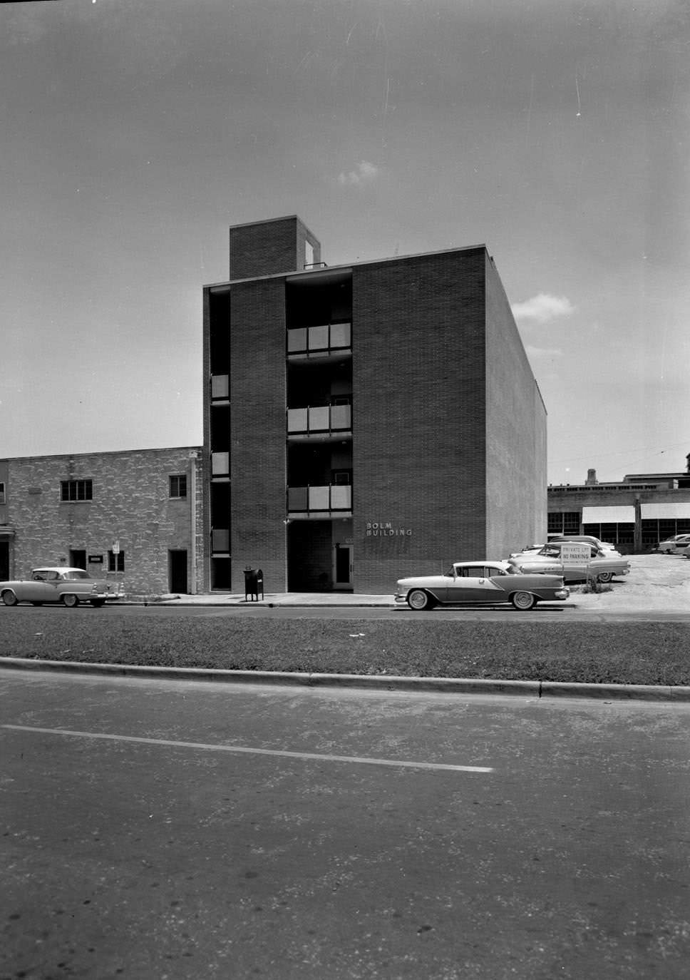 #200 Exterior view of The Bolm Building at 308 W. 15th Street, 1956