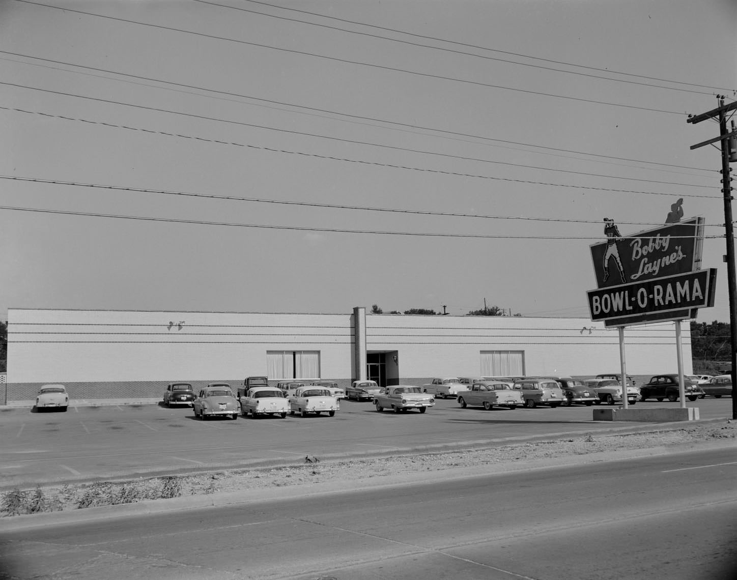 #173 Bowl-O-Rama parking lot. Austin, Texas. Located at 517 South Lamar, 1959