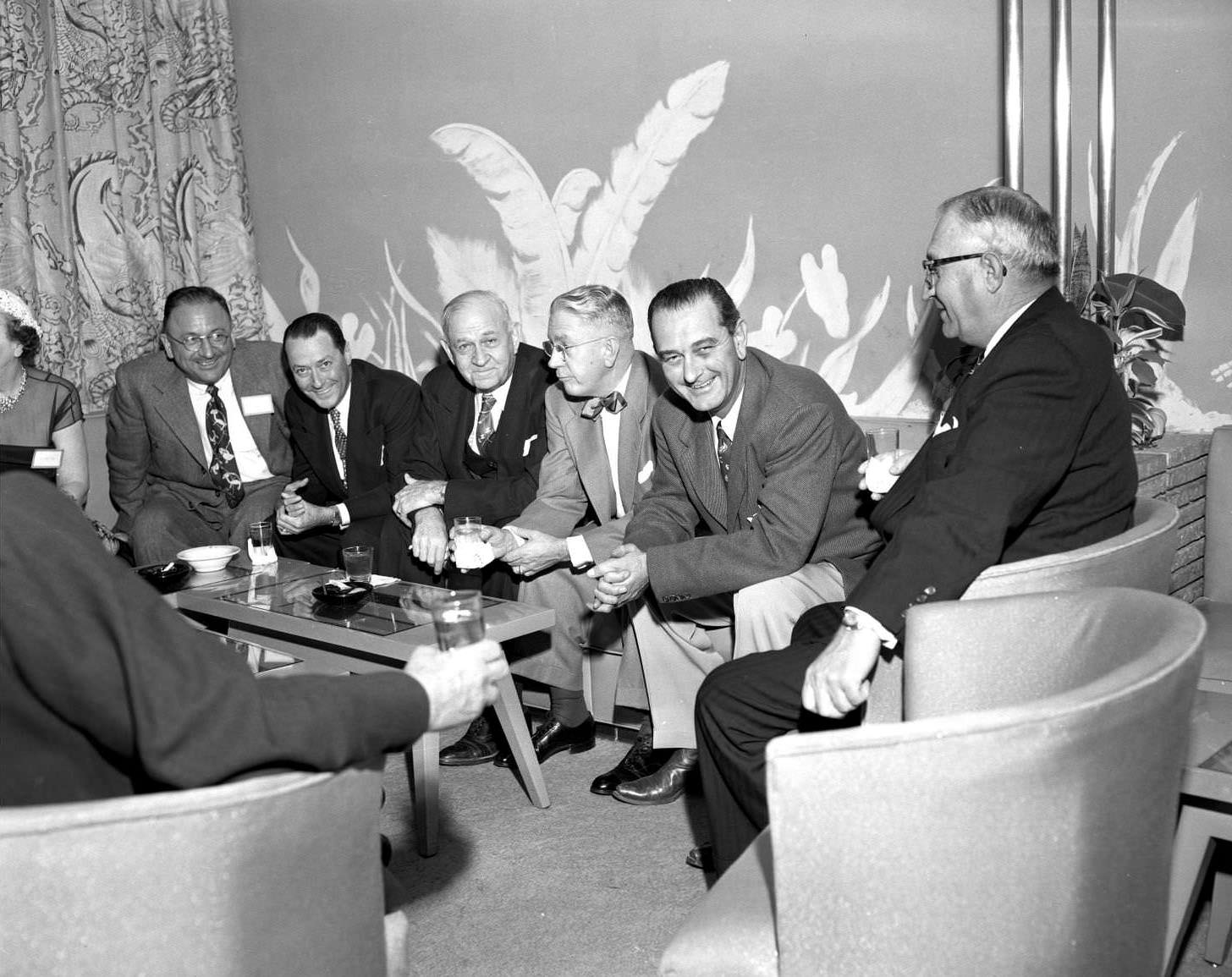 #18 Six men seated around a small table. 5th from left is then Senator Lyndon Johnson, 1953