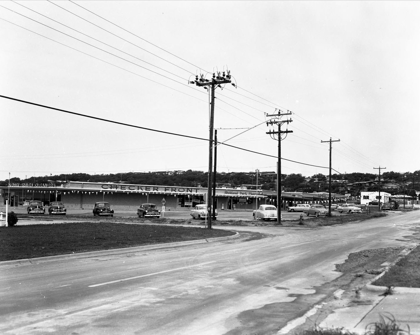 #196 Checker Front Grocery Store #20 which was located at 5028 Fairview Drive in Highland Park. Kelly Smith Cleaners and Highland Park Pharmacy, 1955