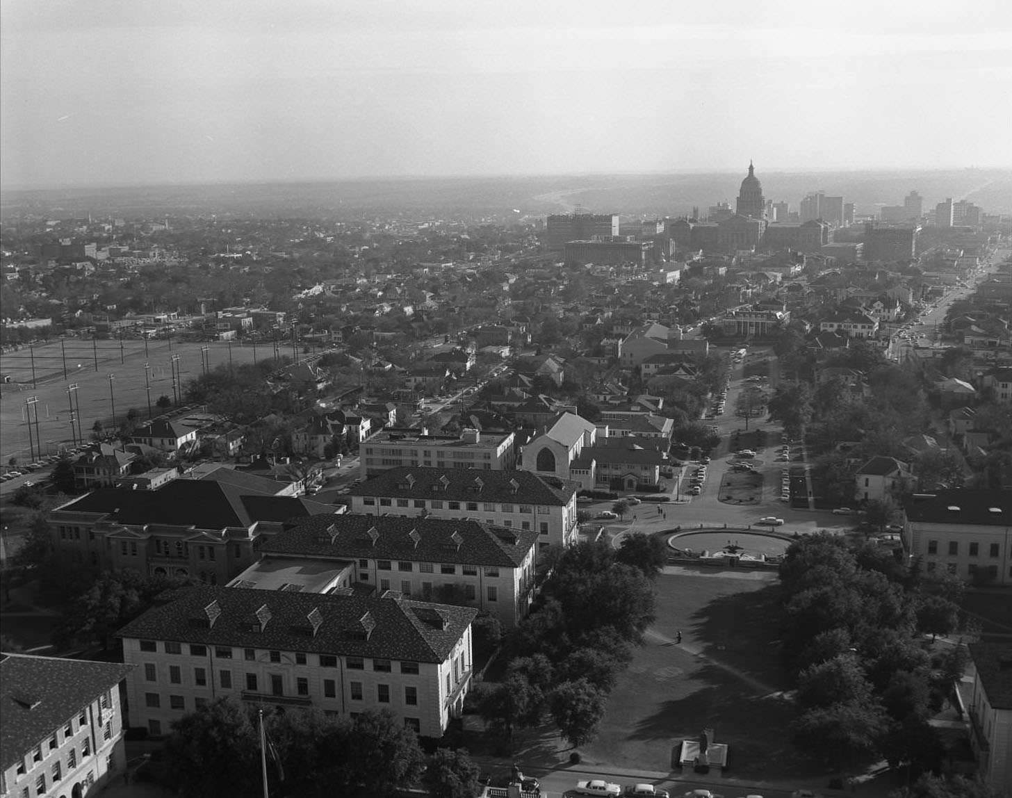 #71 View looking south of UT Tower on South Mall, facing further on to Downtown Austin, 1958