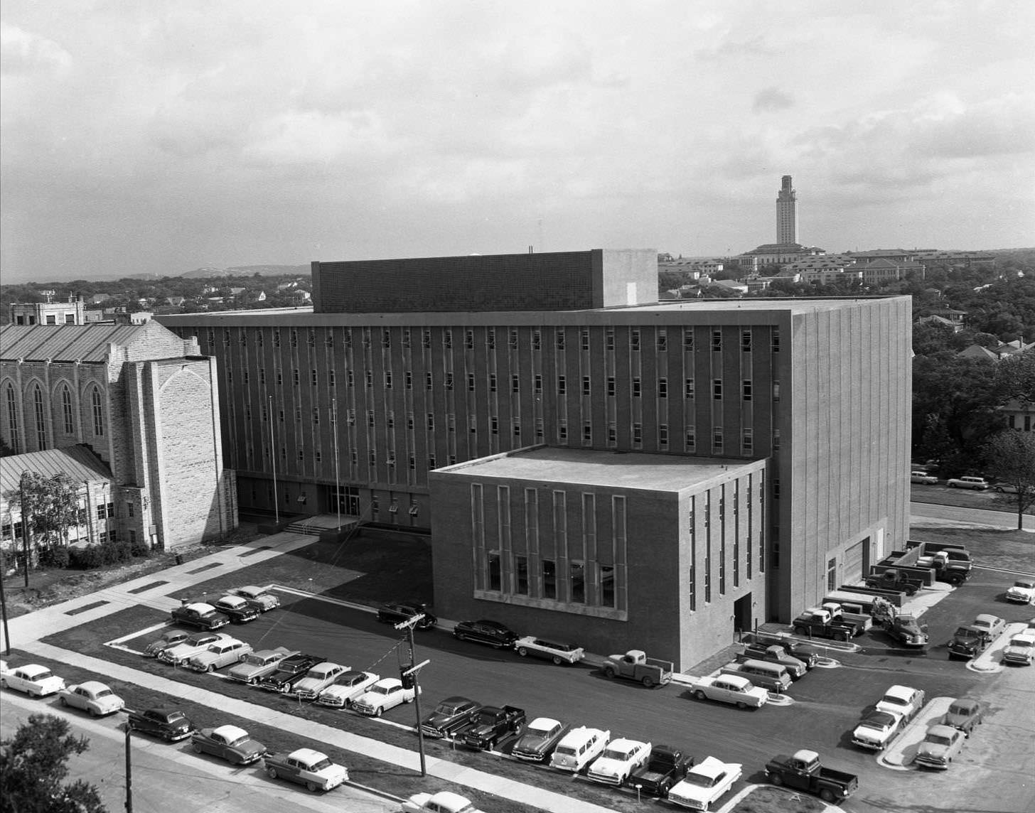 #74 Aerial shot of finished TEC Building. Brazos St on the lower right and 14th on the lower left, 1958