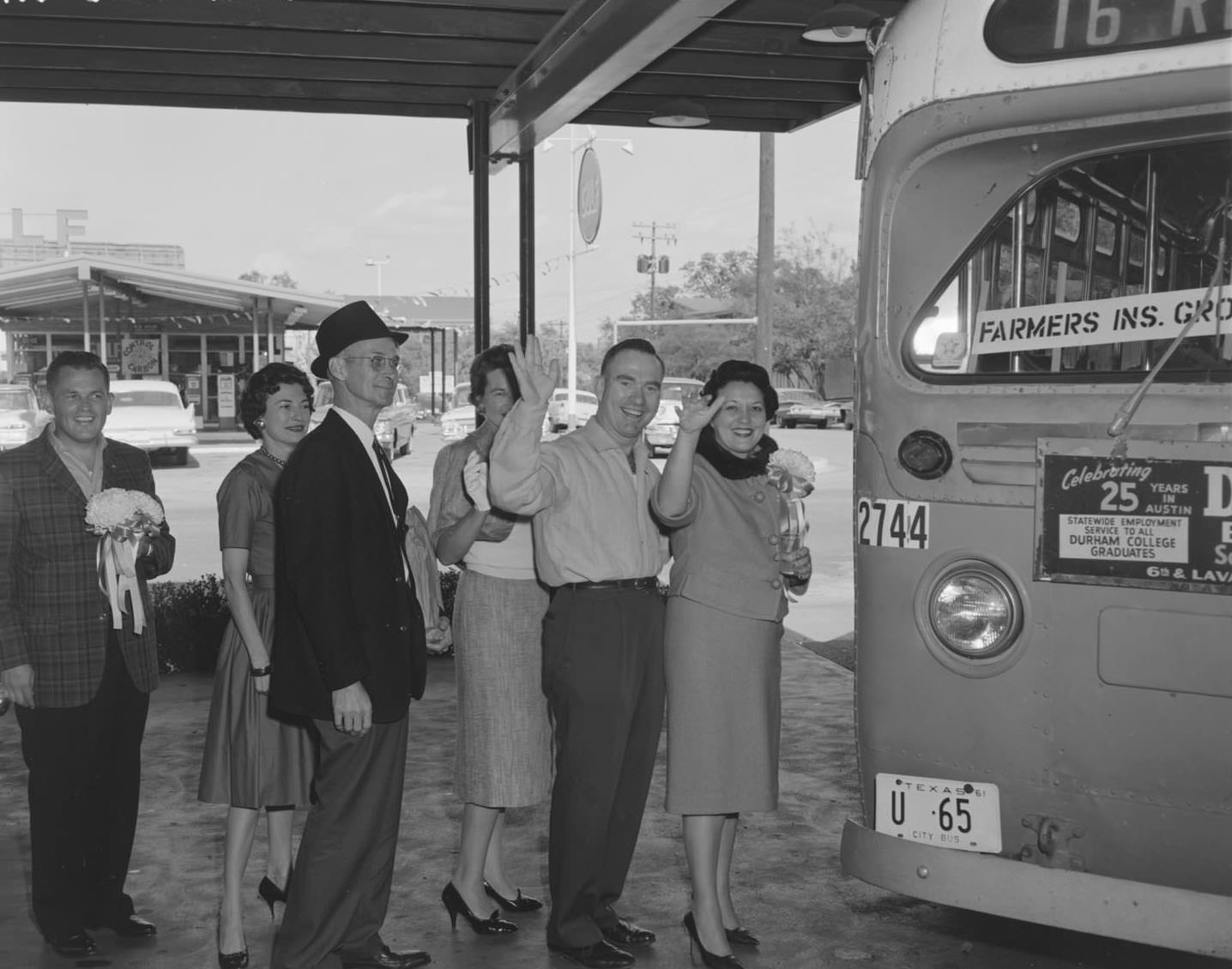 #141 A group of people boarding a bus for a Friday night cocktail party.1961.