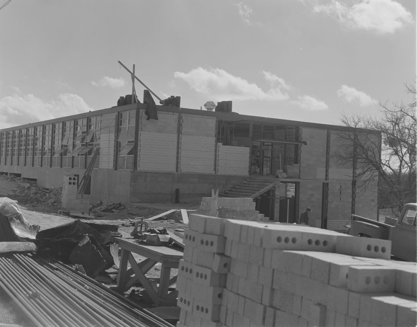 #158 Bricks in front of the construction of Pearce Jr. High School, 1961