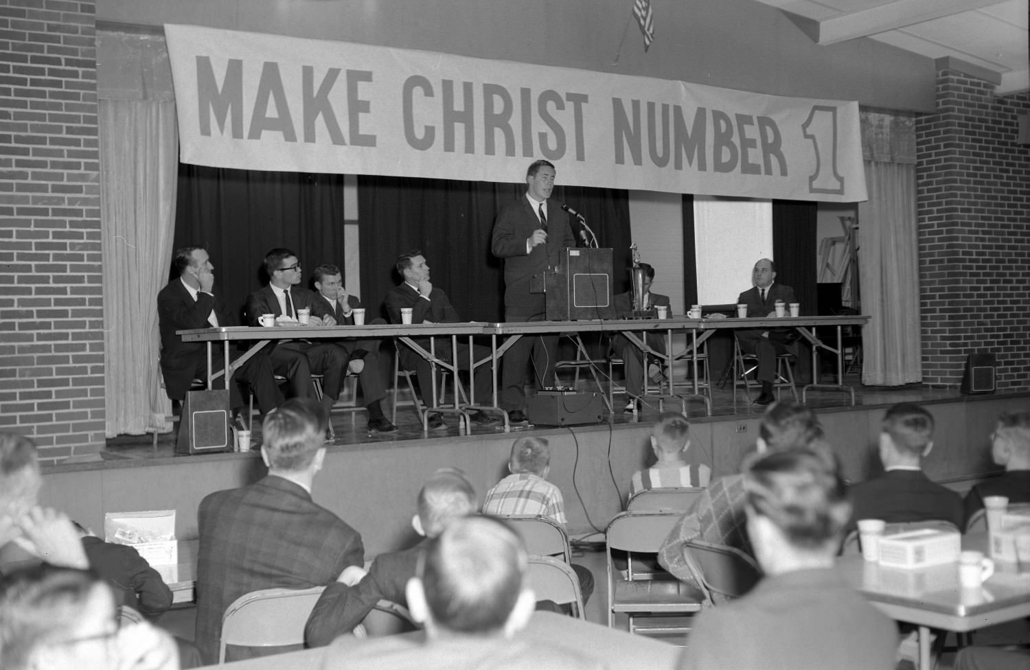 #166 Unidentified man giving speech in the Fellowship Hall at Hyde Park Baptist Church, Austin, 1966