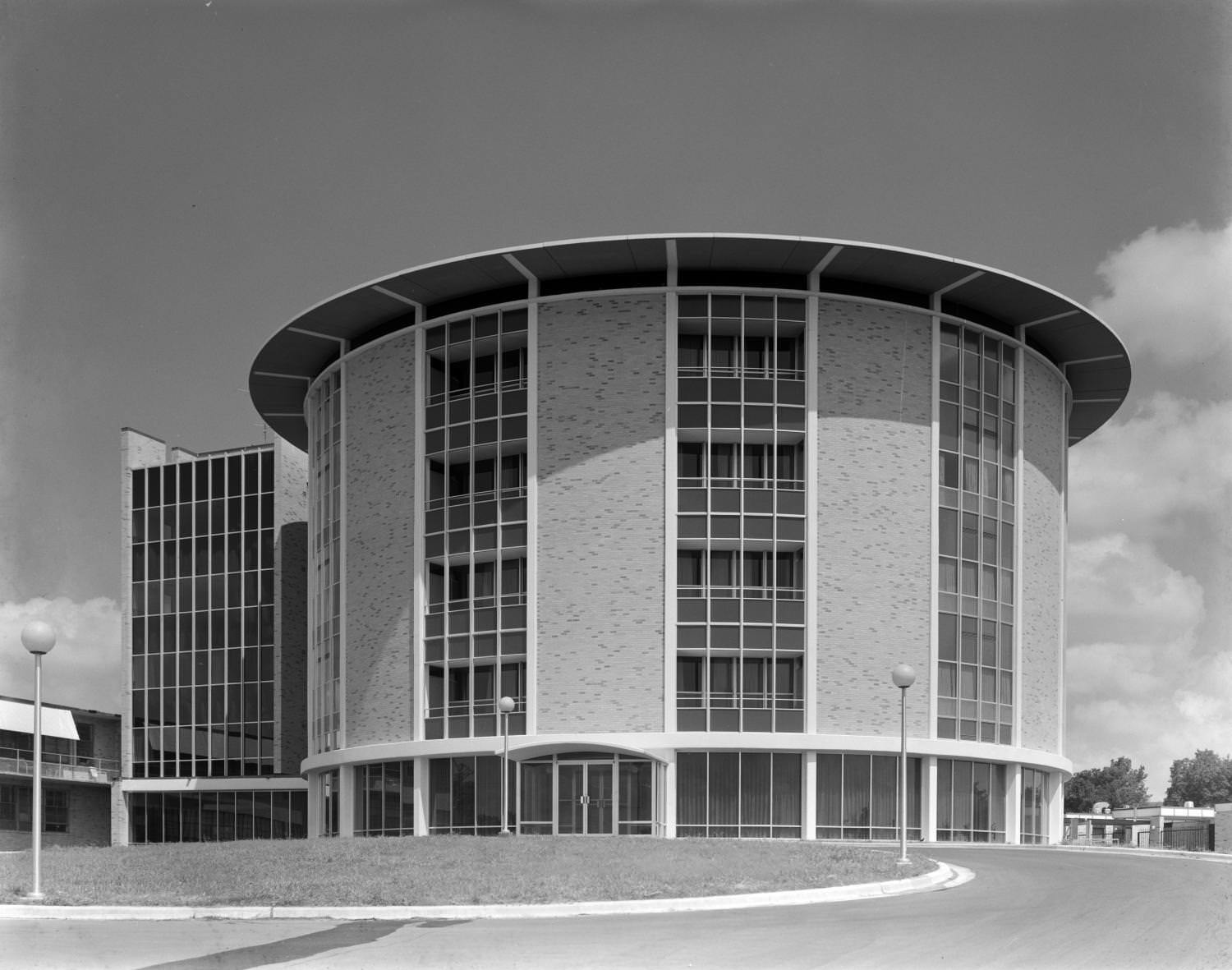 #36 A round five-story building of a modern, postwar design, 1965