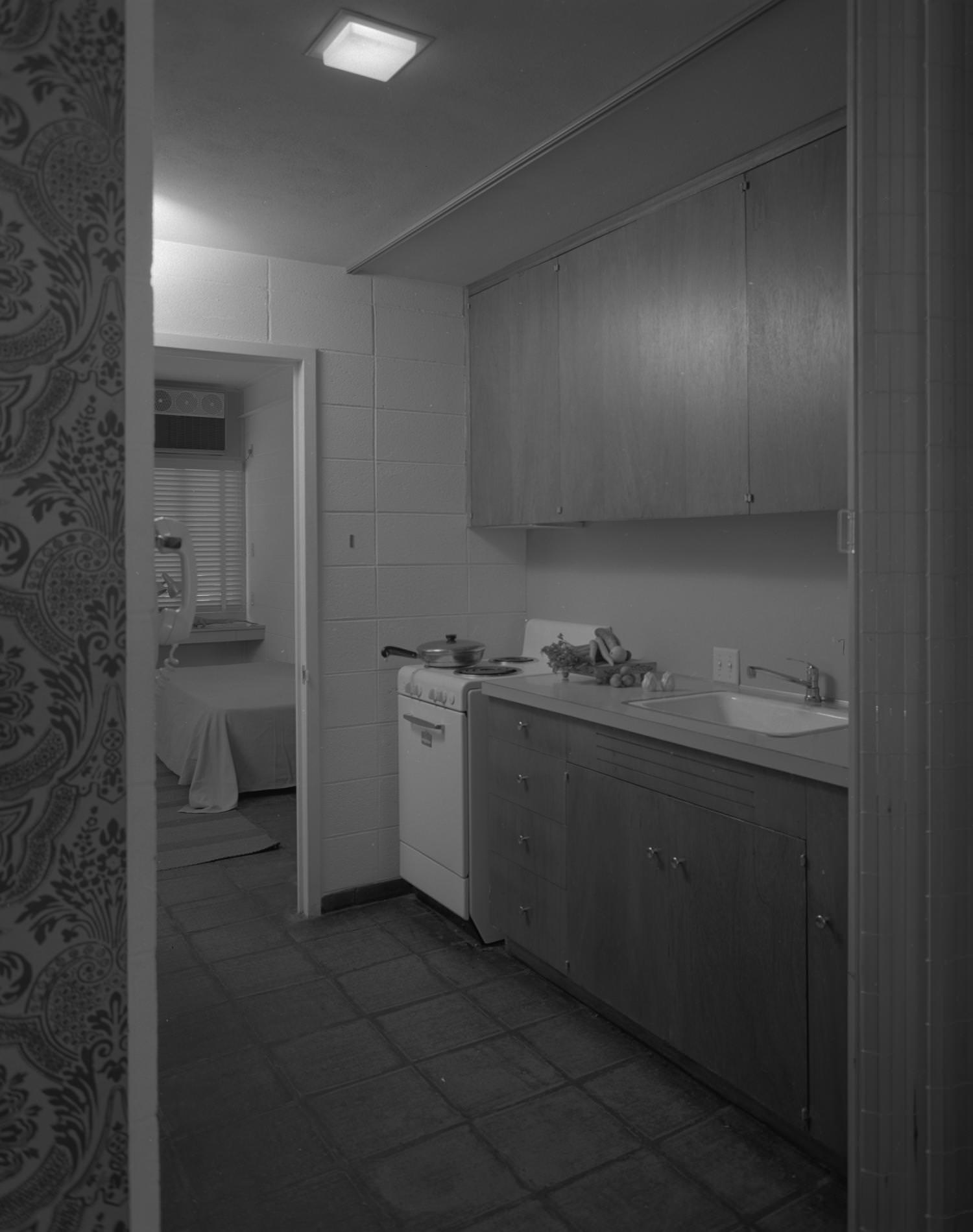 #209 A small apartment kitchen area, 1960