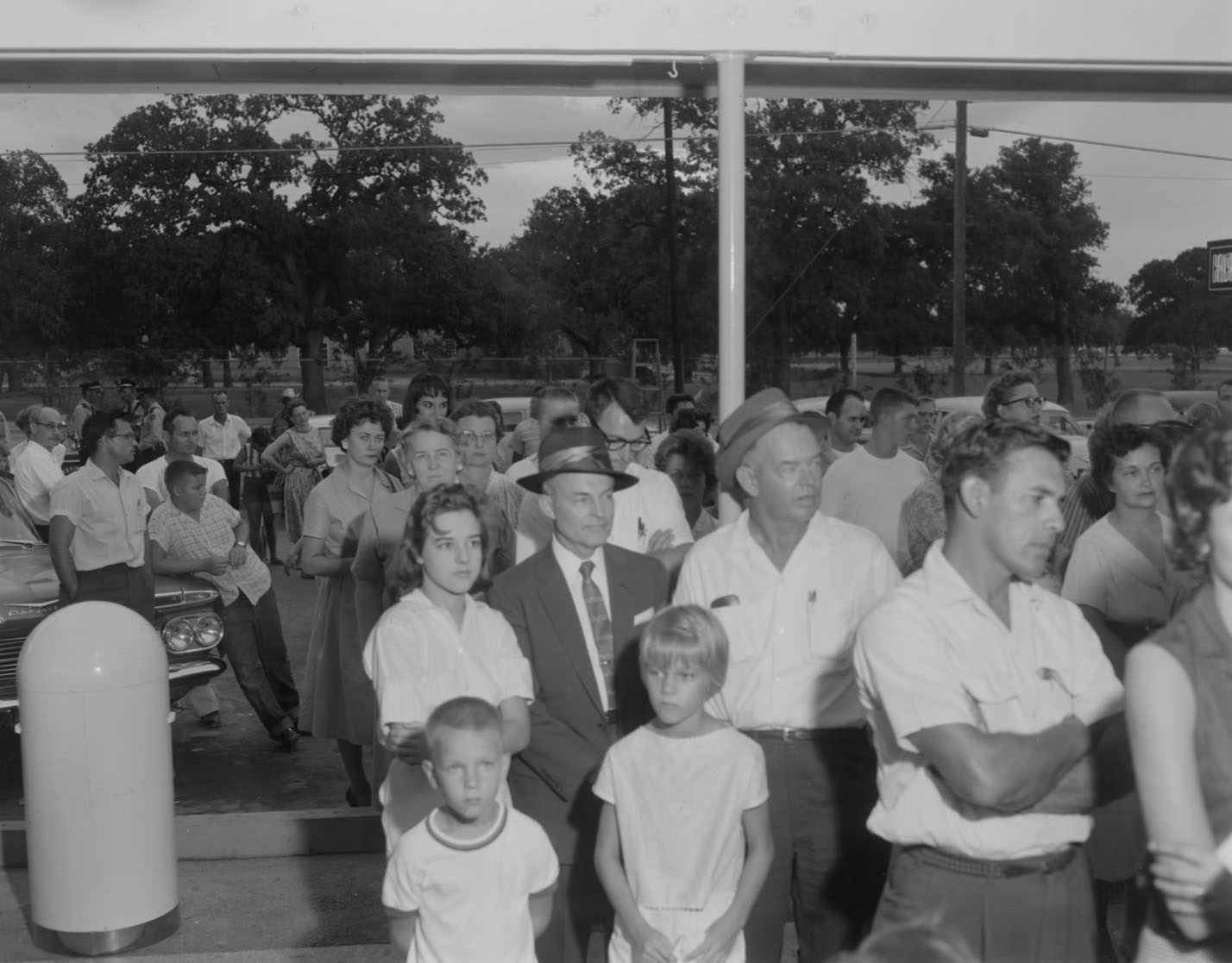 #131 Crowd standing in front of Kentucky Fried Chicken stand, Austin, 1960