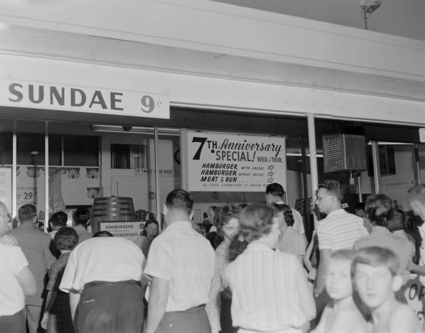 #133 Customers standing in front of Kentucky Fried Chicken stand, Austin, 1960