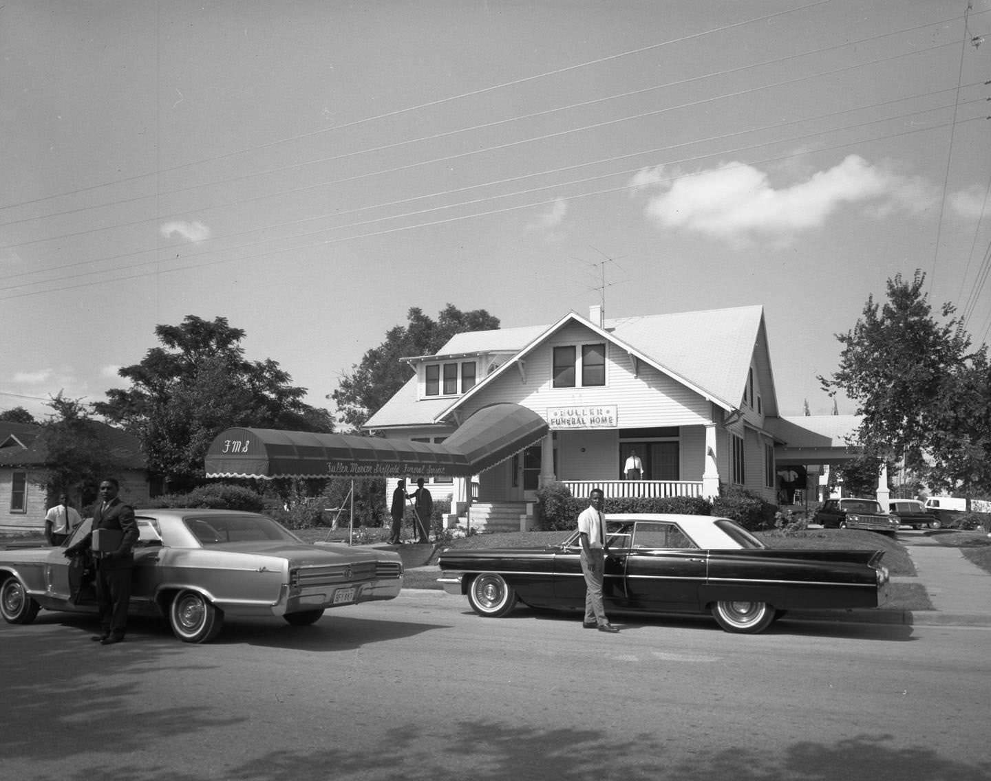 #138 Direct head on exterior shot of funeral home, 1164 Angelina St., Austin, 1964