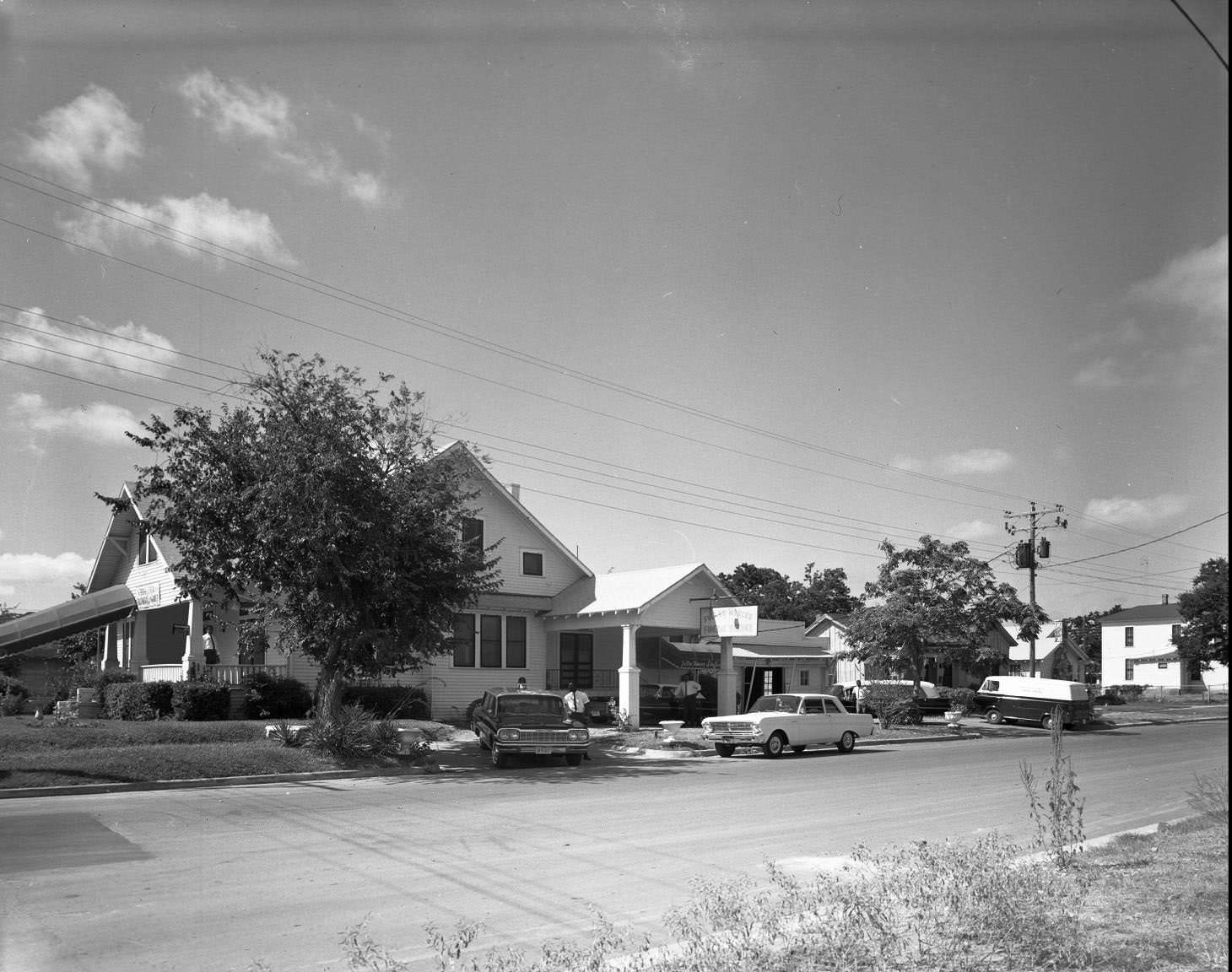 #139 Exterior shot of funeral home, 1164 Angelina St., Austin, 1964