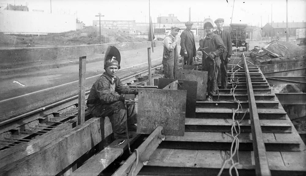 #163 Men working on Denver City Tramway Company streetcar tracks in Denver, 1904