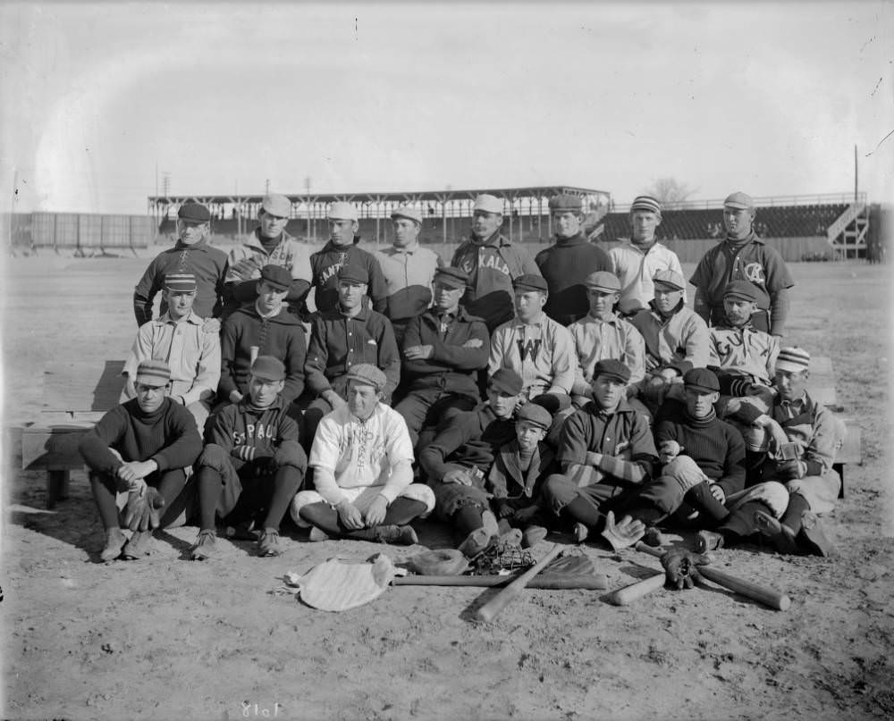 #40 Members of the Denver Bears baseball team pose outdoors at a baseball field in Denver, 1909