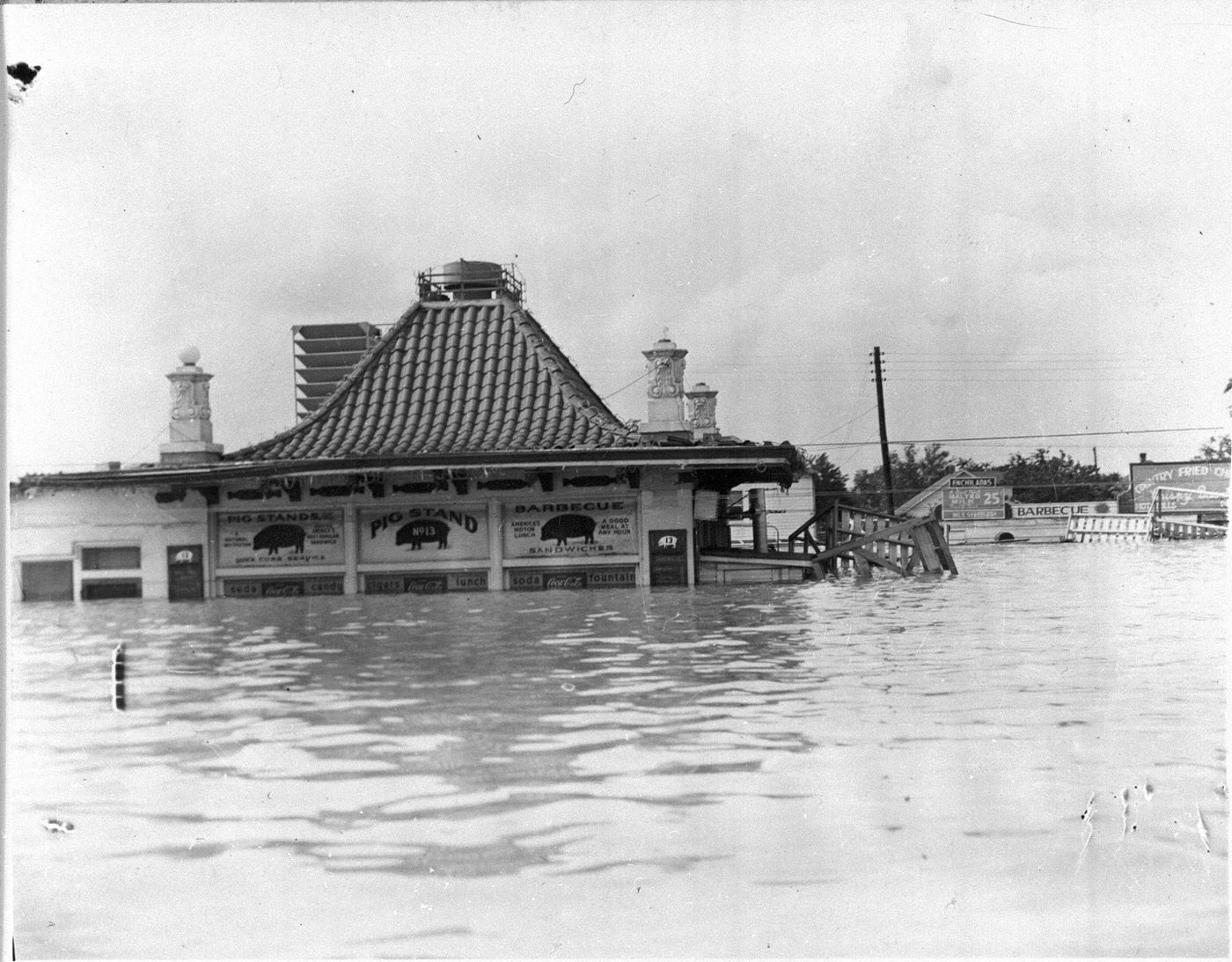 #85 Pig Stand restaurant partially under water during the May 1949 flood in Fort Worth, Texas, 1949