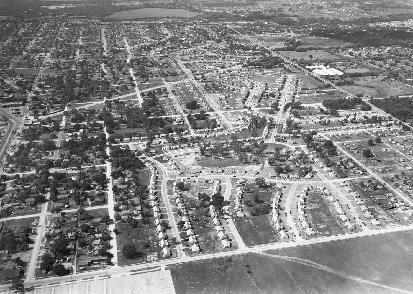#64 Aerial view of west Fort Worth homes between Seventh Street and White Settlement Road near Bailey, 1945