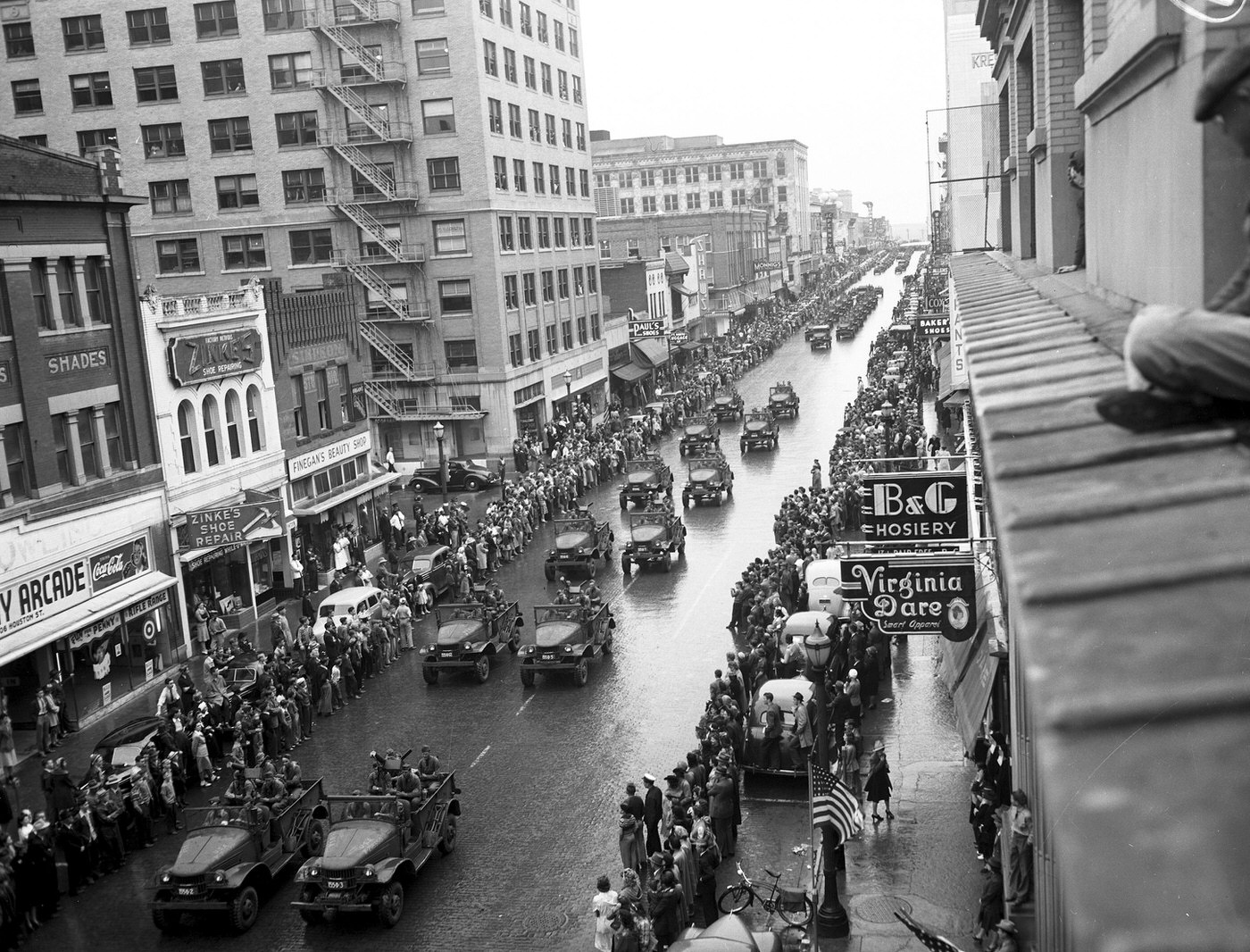 #65 Army Day Parade at downtown Fort Worth. Crack troops of the 155th Infantry Regiment, 31st Division, paraded downtown Fort Worth Monday morning between crowd-lined sidewalks, 1942