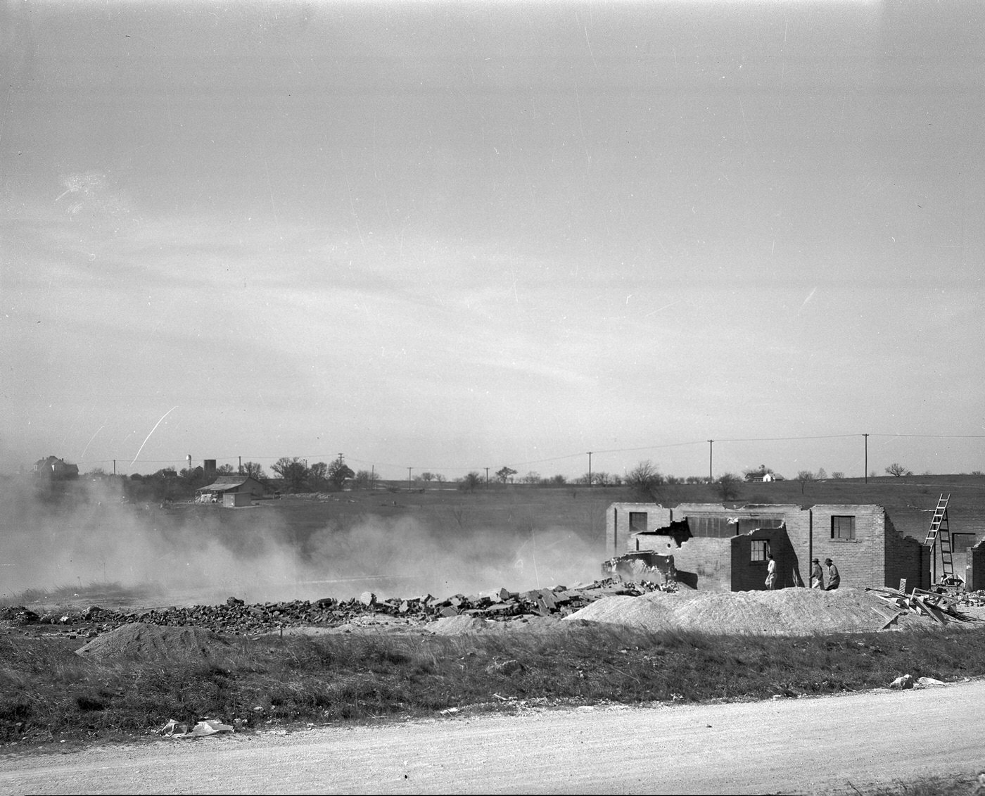 #197 The Arlington Heights landmark demolition of a 75 foot incinerator, 1948