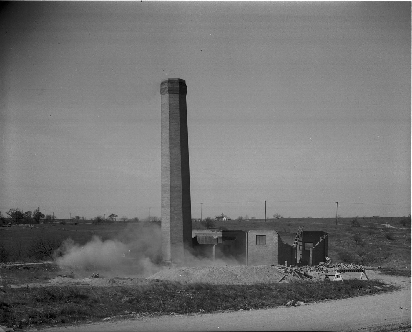 #21 The Arlington Heights landmark demolition of a 75 foot incinerator, 1948