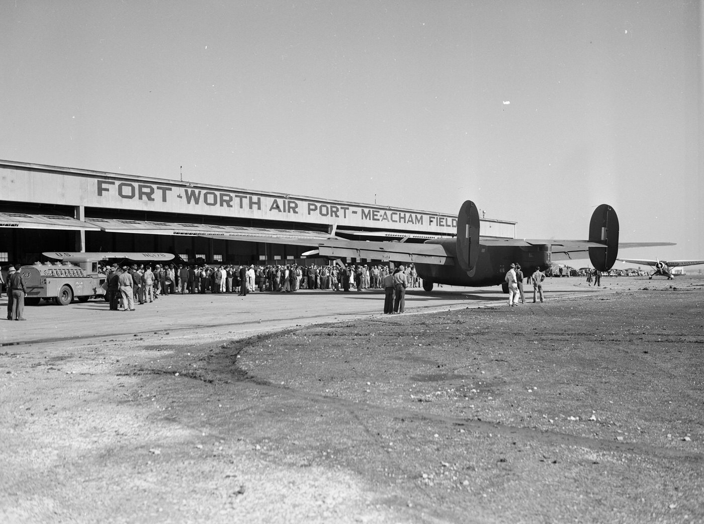#11 Crowd around Consolidated Aircraft 30-ton land bomber at Meacham Field, Fort Worth, Texas, 1941