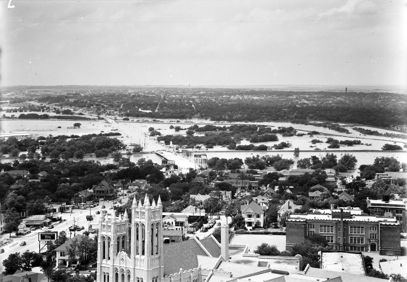 #102 Fort Worth Flood Scene Panorama. Buildings, trees and flooded area are seen.