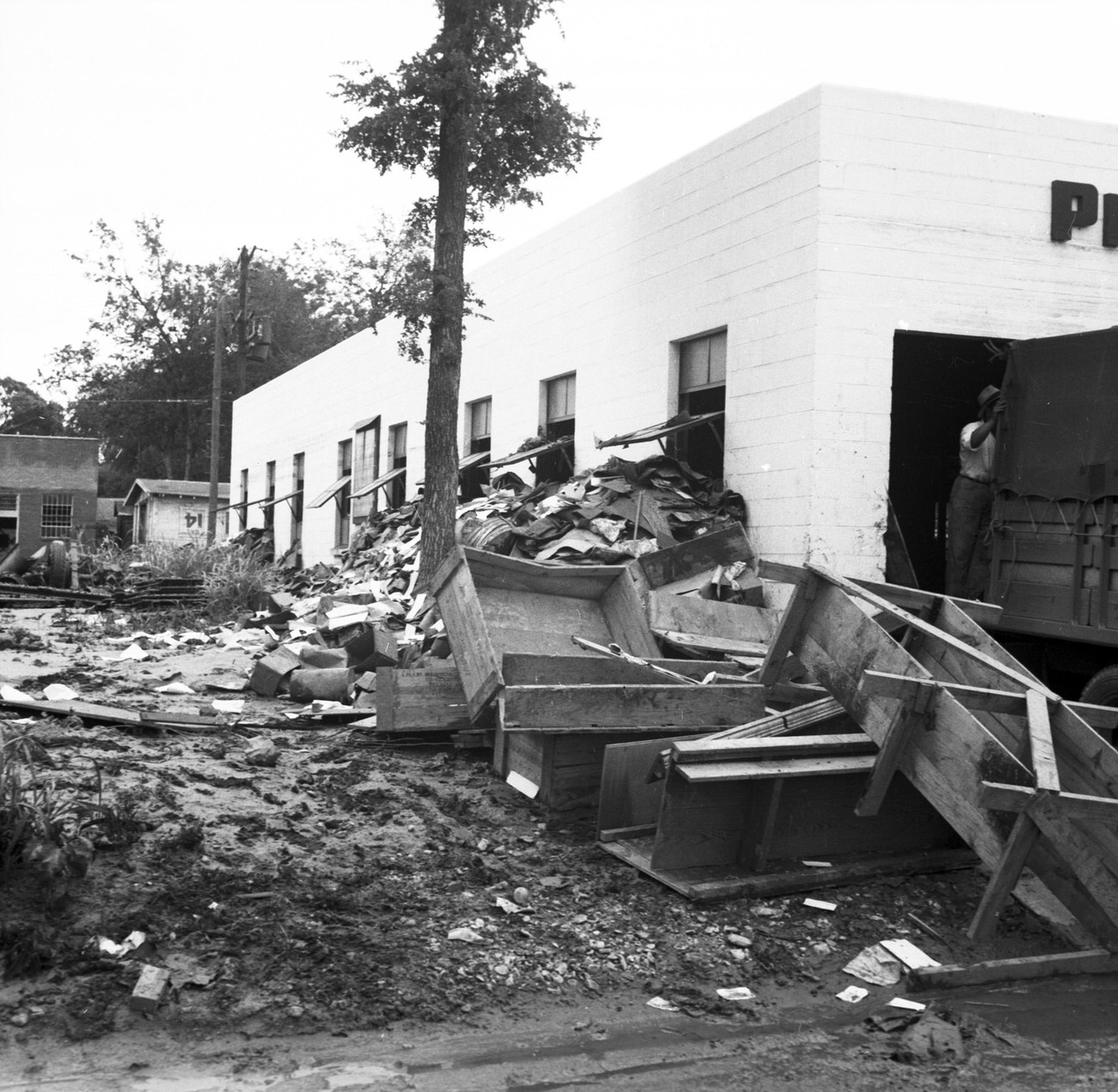 #107 Debris on the side of a building after flood, 1949