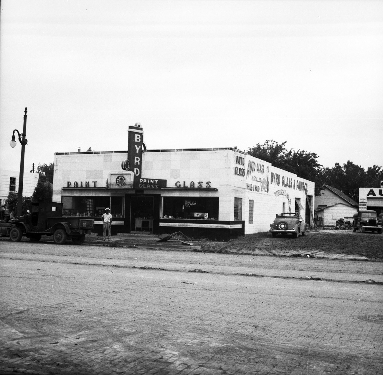 #18 The Byrd Glass & Paint storefront after the 1949 Fort Worth flood.