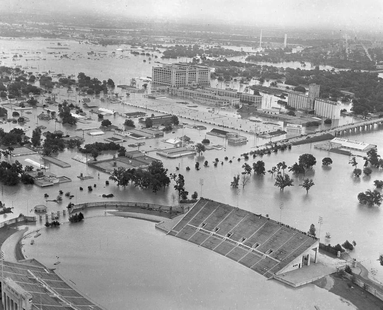#4 Fort Worth flood of 1949 showing 7th Street under water. The large Montgomery Ward building received extensive damage.