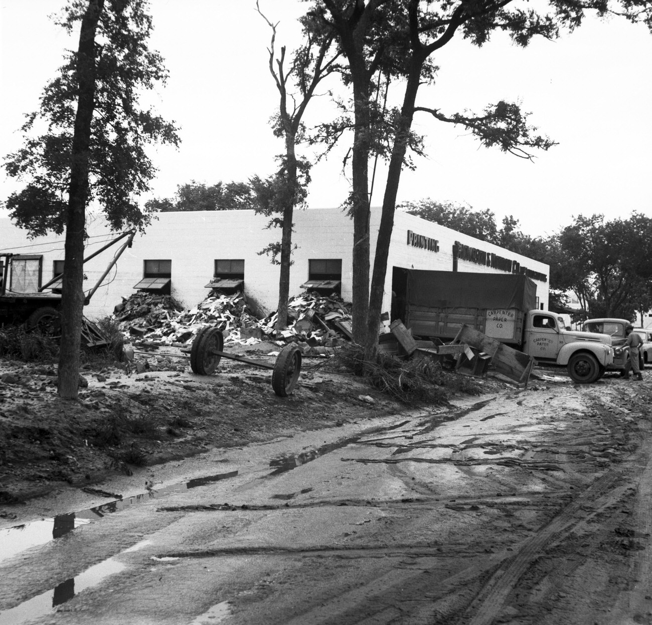 #43 Debris on the side of a building after flood, 1949
