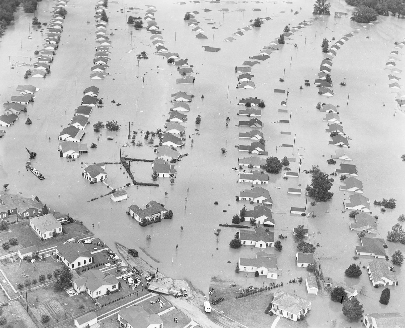 #52 Fort Worth, Texas, flood of 1949, showing a neighborhood of homes under water, 1949