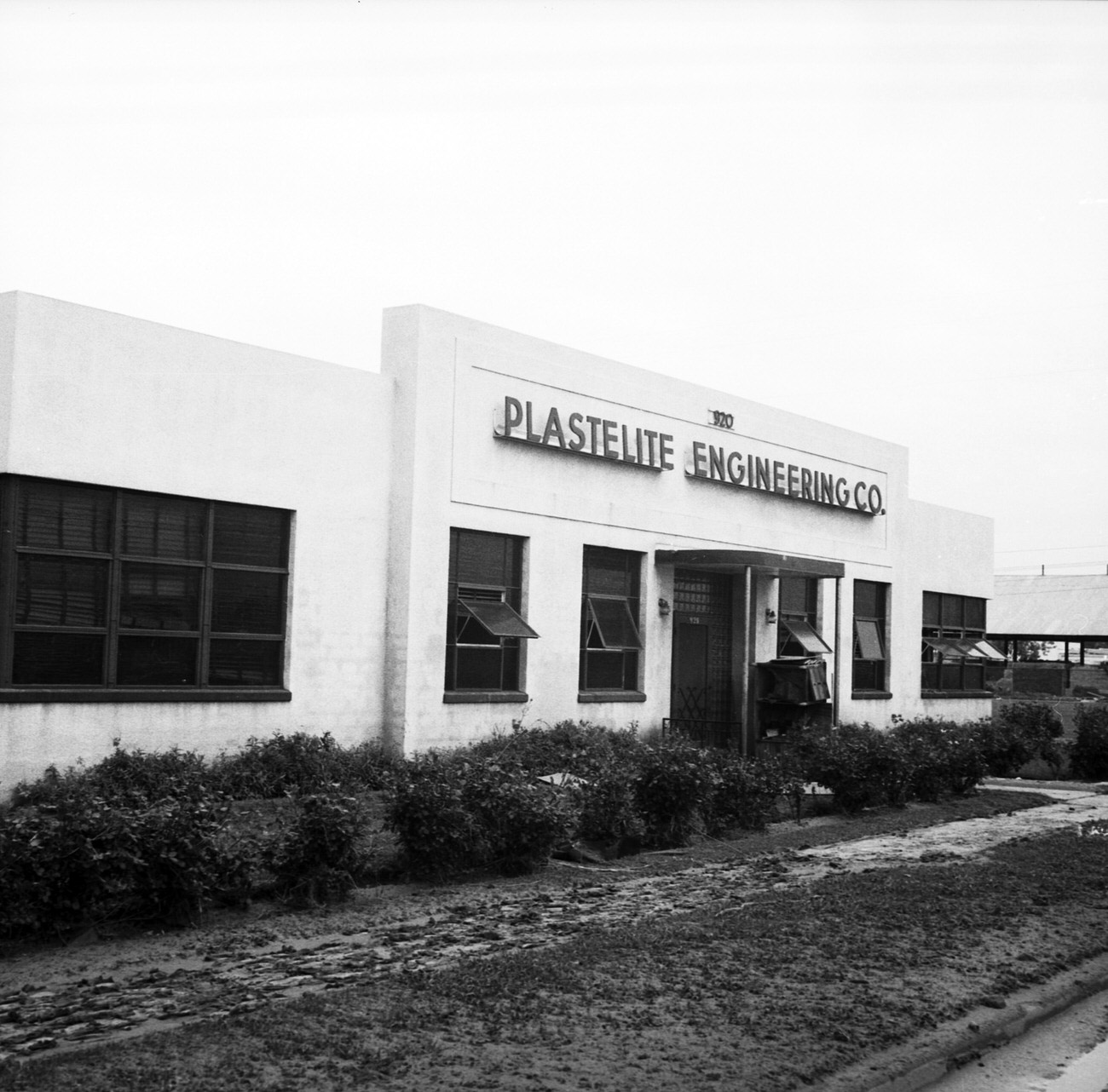 #58 Plastelite Engineering Company building after flood, 1949