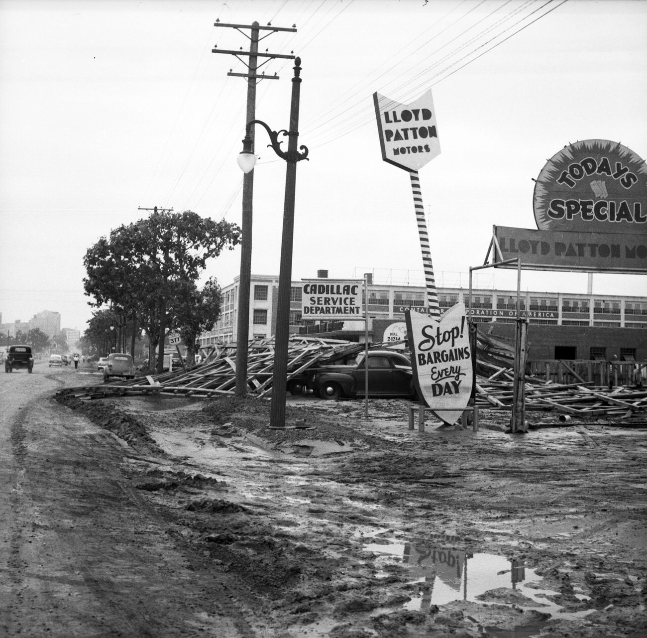 #74 Lloyd Patton Motors after flood, 1949