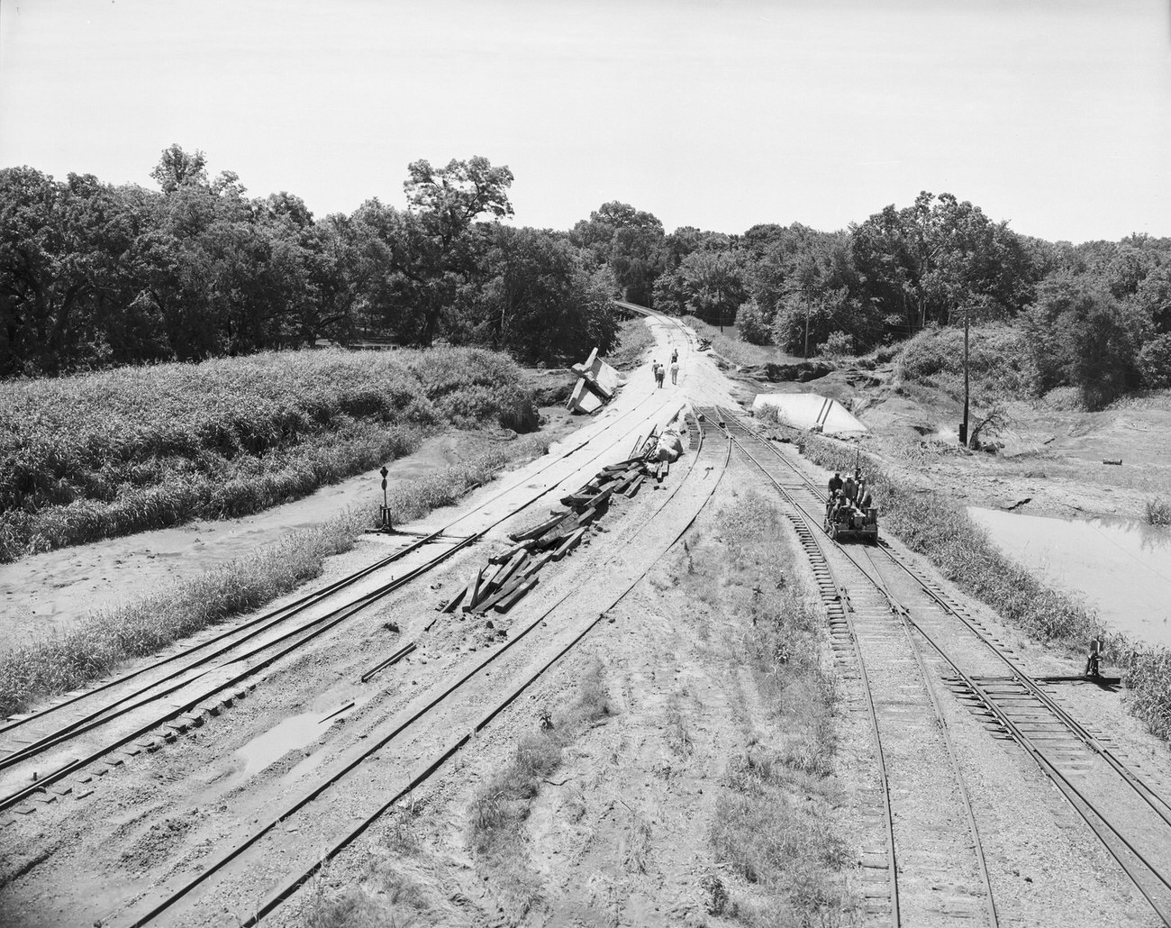 #75 Flood damage looking south at the Frisco Railroad tracks, 1949