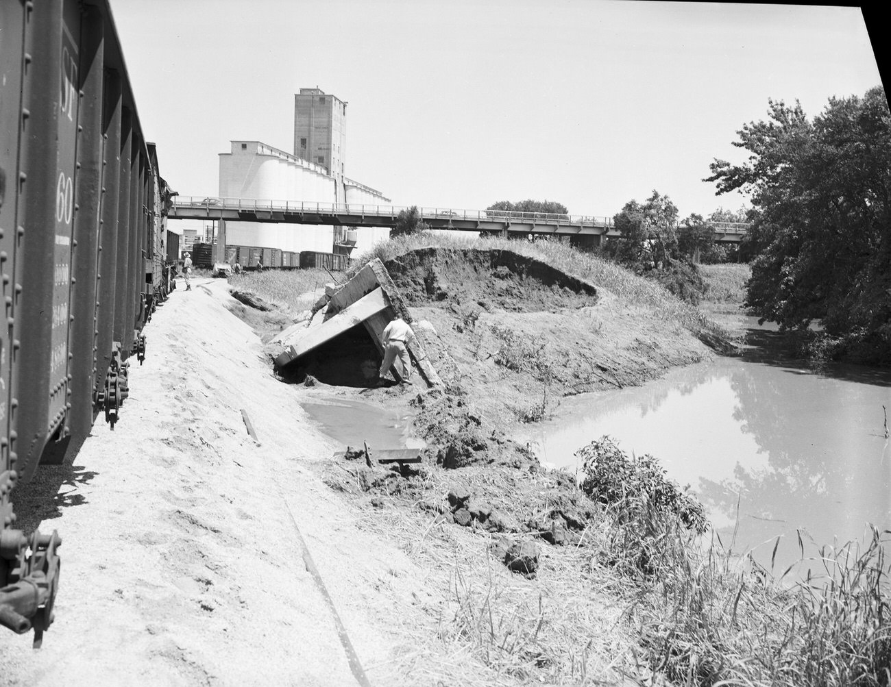 #78 Flood damage looking north and across the levees, 1949